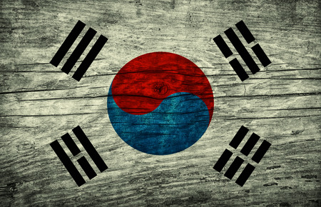 National vintage flag of South Korea on wooden surfaceの写真素材