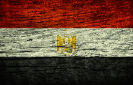 National vintage flag of Egypt on wooden surfaceの写真素材