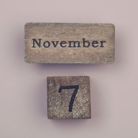 Wooden vintage calendar showing the date 7th of Novemberの写真素材