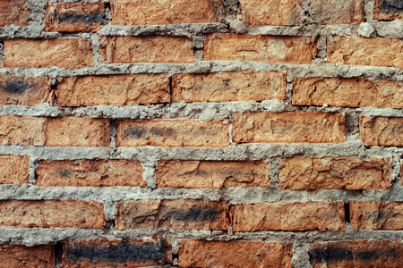 The view is an brick wall. The texture of the brick has a vintage styleの写真素材