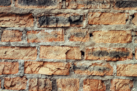 The view is an old brick wall. The texture of the brick has a vintage styleの写真素材