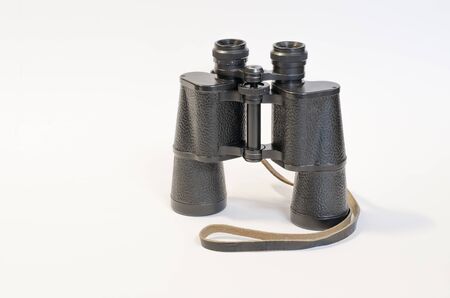 Black binoculars on a white background.の写真素材