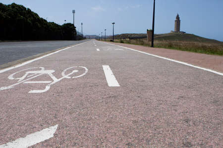 bicycle lane parallel to the Roman lighthouse Torre de HÃ©rcules in A CoruÃ±a, Spainの写真素材