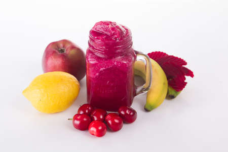 ice shake with cherries, lemon, banana, apple and cherriesの写真素材