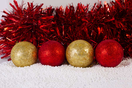 Christmas decoration balls on snow ballsの写真素材