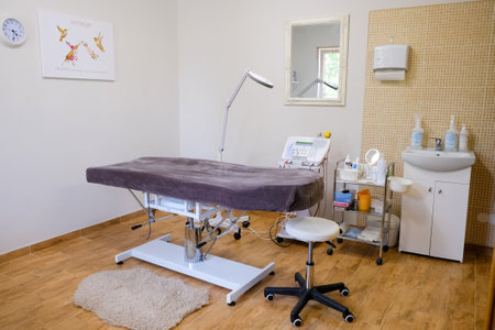 Medical equipment for electrolysis, cosmetology, epilation couch. Beauty salon interior detailsの写真素材