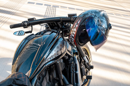 Cool motorbike with helmet on handle of motorcycle the city. high quality photoの写真素材
