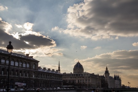 Beautiful sunset at Seine embankment in Parisの写真素材