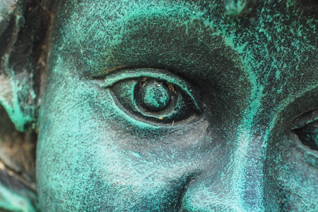 Zoom eye green cupid statue.の写真素材