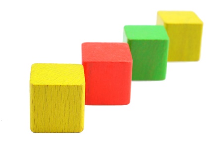 Wooden toy blocks isolated on white backgroundの写真素材