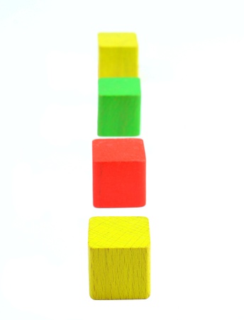 Wooden toy blocks isolated on white backgroundの写真素材