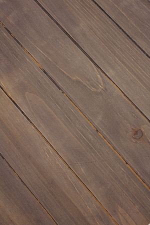 Old wood planks arranged diagonally texture backgroundの写真素材