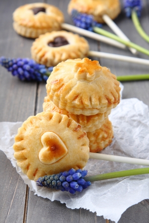 Pie pops with chocolate and muscari flowersの写真素材