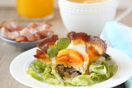 Homemade pancake baskets with egg and mushroomsの写真素材
