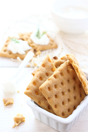 Gluten free crispbread with cream cheese and dillの写真素材