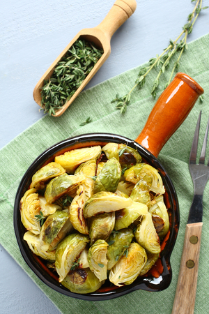 Homemade fried brussel sprouts with garlic and thymeの写真素材