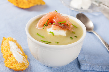 Bowl of creamy leek soup with smoked salmonの写真素材