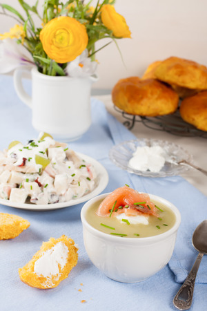 Bowl of creamy leek soup with smoked salmonの写真素材