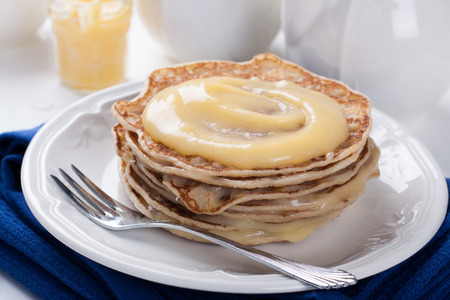Stack of pancakes with homemade lime curd.の写真素材