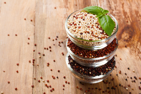 White, red, black and mixed raw quinoa grainの写真素材