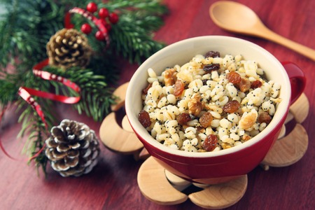 Pot with kutia. Traditional Christmas sweet meal in Ukraine, Belarus and Poland. Toned photo.の写真素材