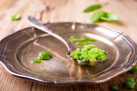 Sorrel granita in metal spoon. Healthy summer food concept.の写真素材
