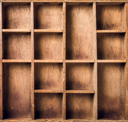 Empty wooden box with compartments, top view.の写真素材