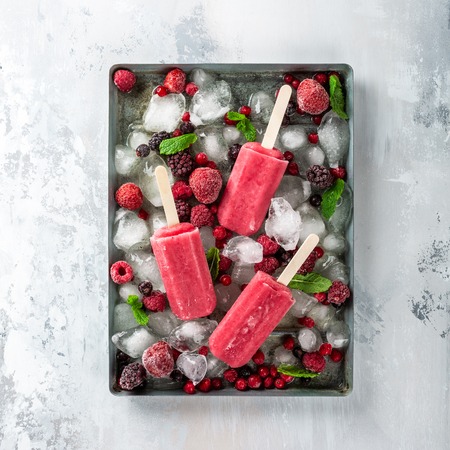 Homemade berry popsiclesの写真素材