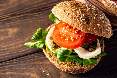 Italian Caprese sandwiches with fresh tomatoes, mozzarella cheeseの写真素材