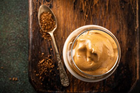 Dalgona coffee in glass cupの写真素材