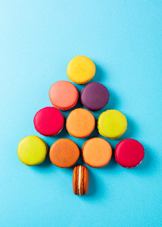 Christmas tree shape made of tasty macaronsの写真素材