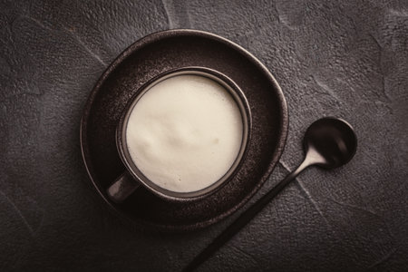 Cappuccino on black background.