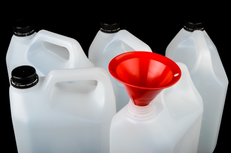 White plastic food grade container isolated on black  Often used for water, alcohol or other liquids の写真素材