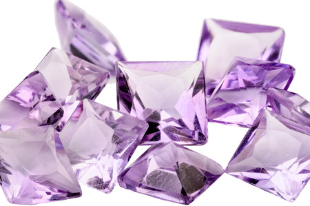 A pile of violet princess cut Amethystsの写真素材