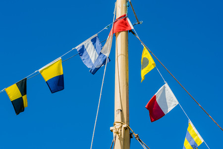 Bunting on ship for signaling and festivities.の写真素材