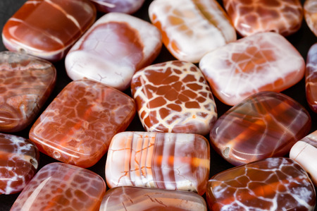 Rounded orange rectangular fire agate beads.の写真素材