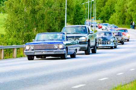 Ronneby, Sweden - June 26, 2015: Veteran car street cruise on public roads. Chevrolet impala blue 1963.のeditorial素材