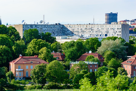 Stockholm, Sweden - July 05, 2015: Radiohuset, the Swedish Radio headquarter with surroundings. Sveriges Radio (SR) logo seen on satellite dish.のeditorial素材