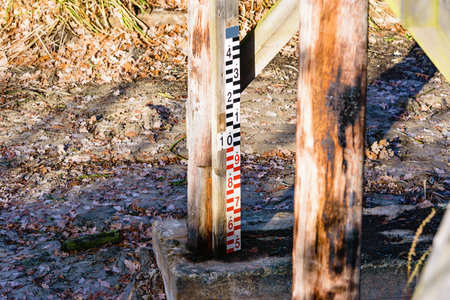 The drought is draining all the water from under the bridges. Here is a water level marker but no...