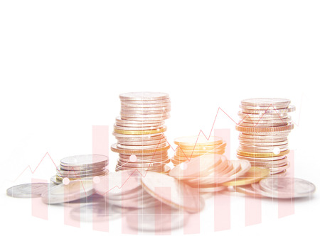 Rows coins for finance and banking concept on white background, color filter, graphs and chartの写真素材
