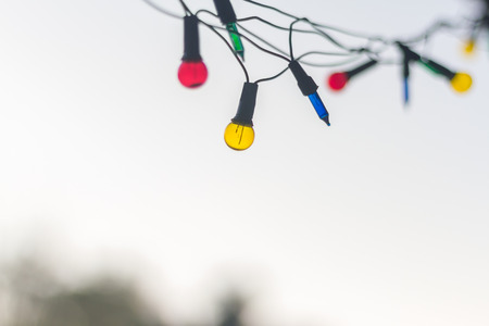 Christmas lights, Closeup, Christmas background with lights, Christmas lights border, Glowing colorful Christmas lights on background

の写真素材
