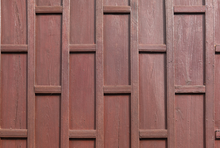 Wall made of wooden brown on plank texture backgroundの写真素材
