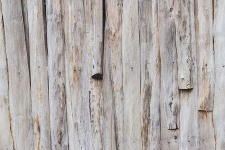 Wall made of wooden brown on plank texture backgroundの写真素材