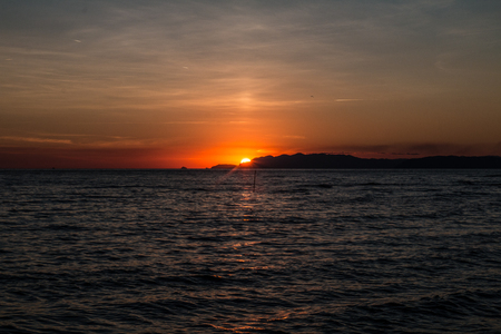 sunset from the Tuscan Riviera in the Tyrrhenian Seaの写真素材