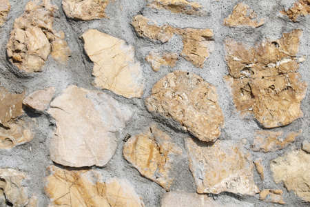 texture of a wall of stones and stonesの写真素材