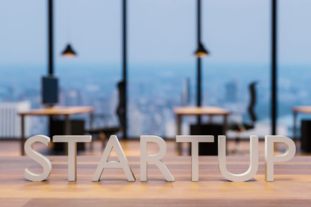 startup logo on clean wooden desk in modern office with skyline view 3d rendering