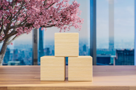 wood table top and blurred bokeh modern office interior three wooden cubes, 3D illustrationの写真素材