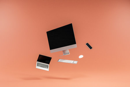 pc, keyboard, mouse, display electronics floating in the air with orange background; cyber monday and black friday deals marketing; 3D illustrationの写真素材