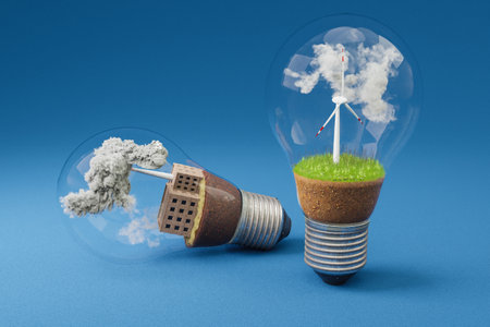 lightbulbs with minature wind turbine and coal-fired power station  inside; green soil and clouds; pollution and smoke; renewable energy concept; infinite background; 3D Illustrationの写真素材