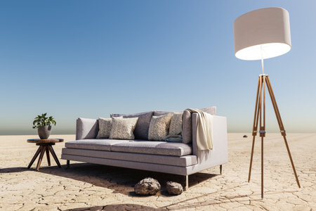 lonely living room couch in desert environment; immersion entertainment movie concept; 3D illustrationの写真素材